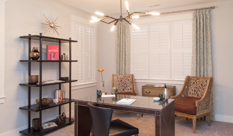 Raleigh home office with plantation shutters.